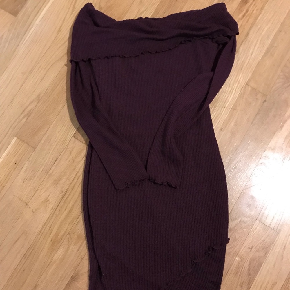 Woman’s purple off the shoulder knit dress
